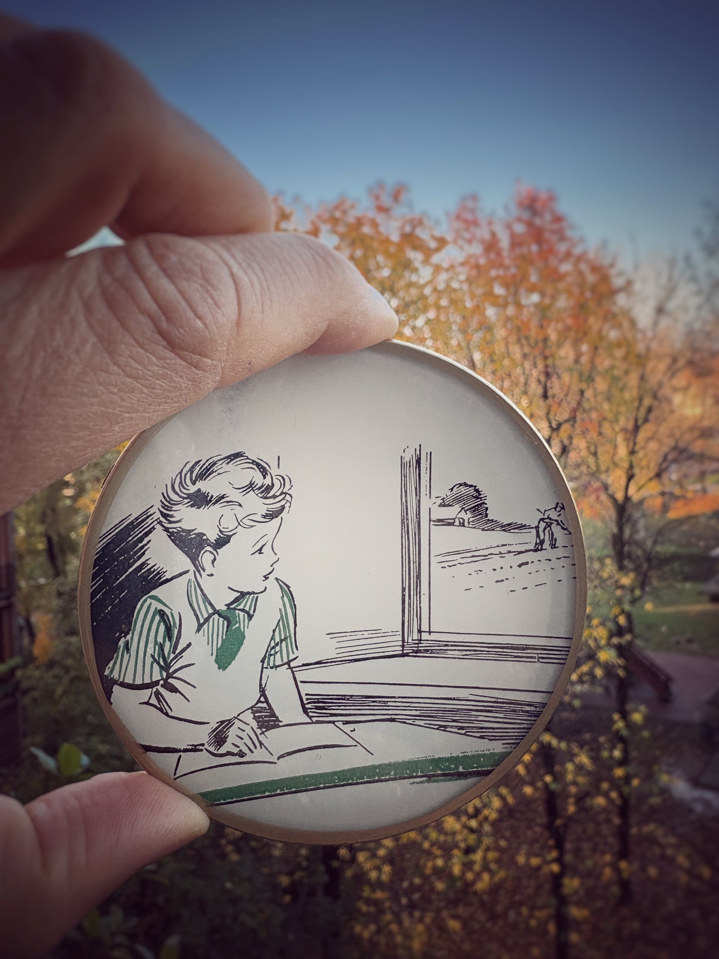 Mini shelfie: Child looking at the countryside 