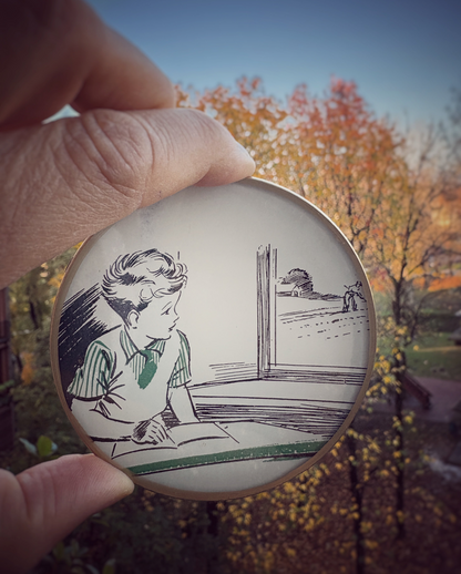 Mini shelfie: Child looking at the countryside 
