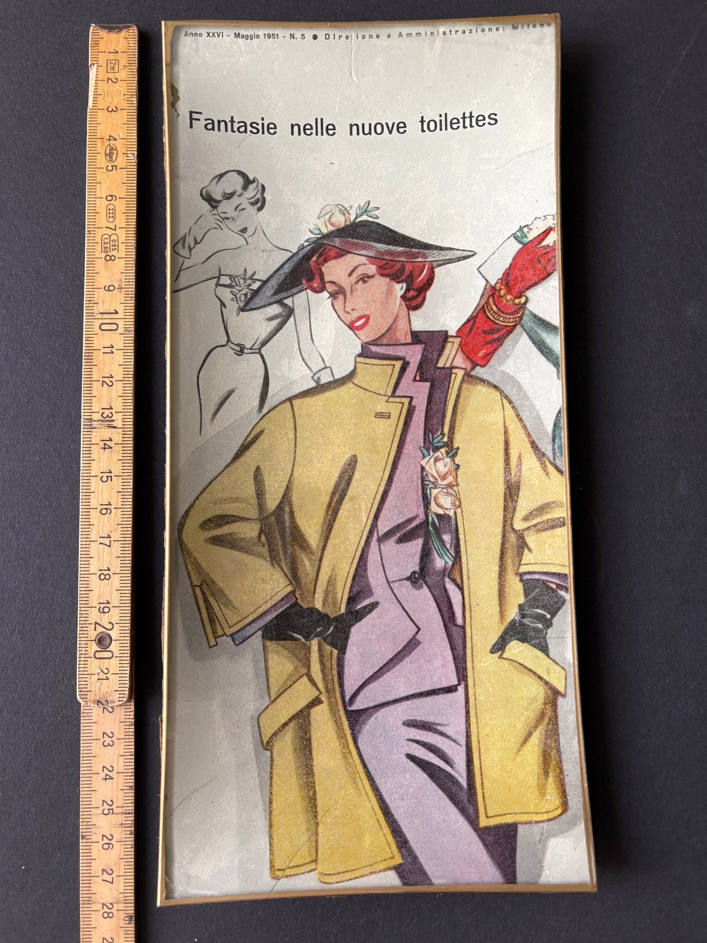 Shelfie: Model in yellow coat