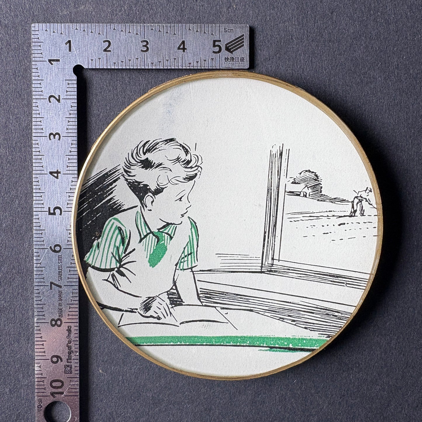 Mini shelfie: Child looking at the countryside 