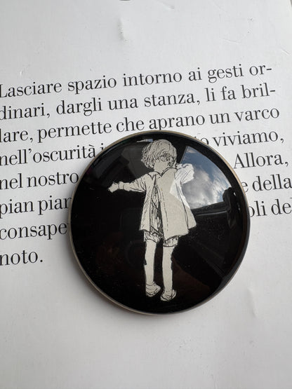 Variegated wink: Christopher Robin from behind on a black background