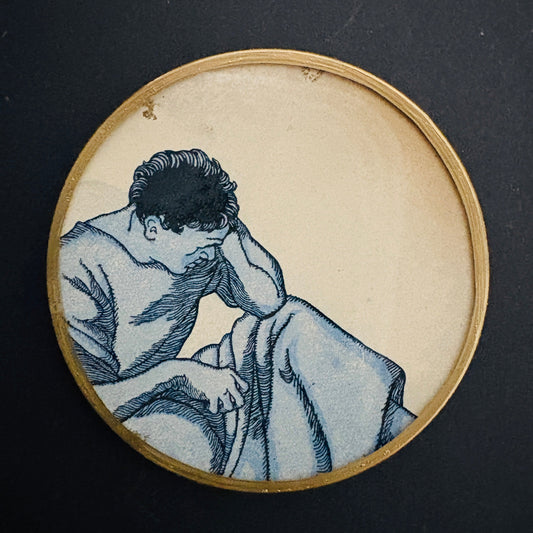 Mini shelfie: Thoughtful man in blue