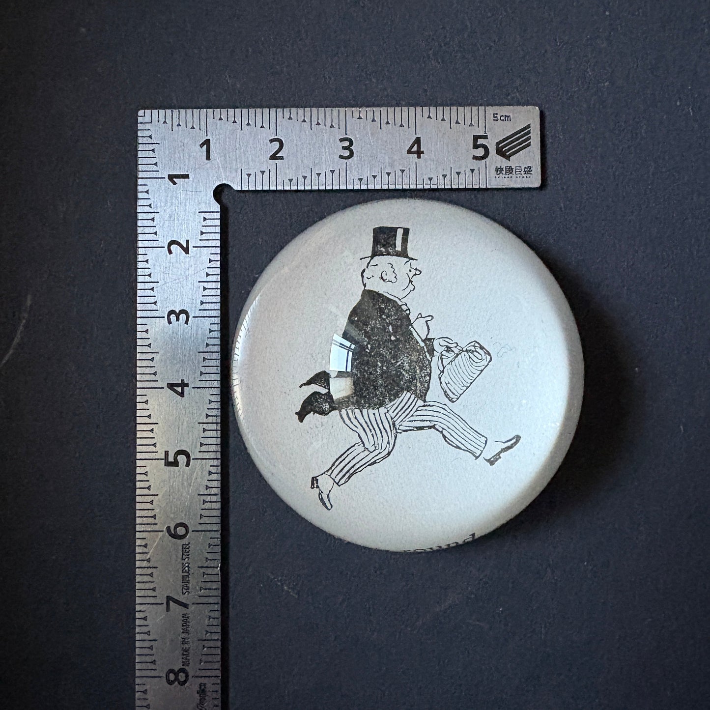 PostaFerma: Man in a tuxedo and a briefcase