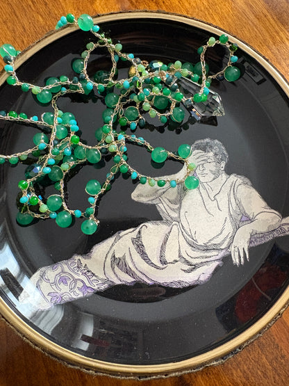 Shelfie: Ancient Roman man leaning on triclinium