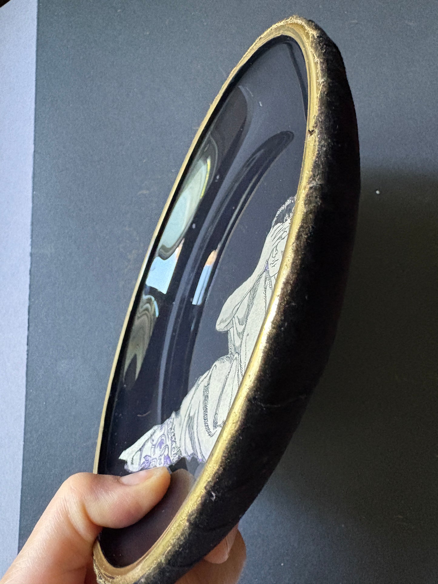 Shelfie: Ancient Roman man leaning on triclinium